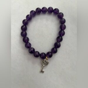 Amethyst beaded charm bracelet